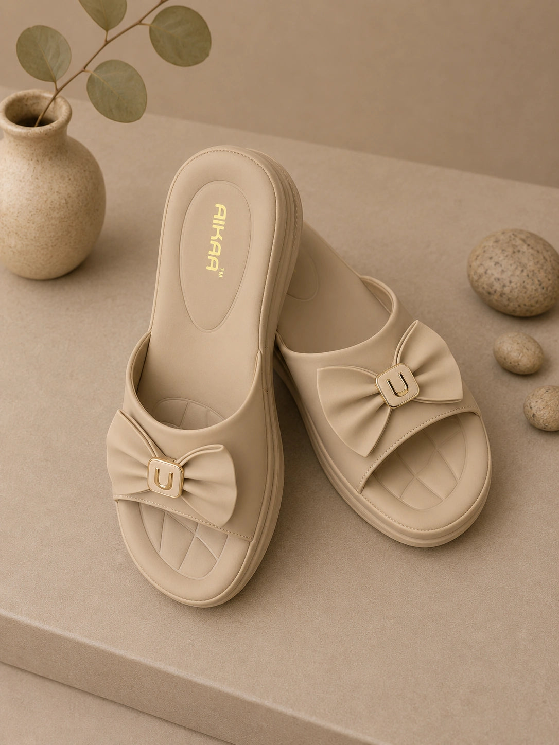 Comfortable women’s beige slipon slides by AIKAA