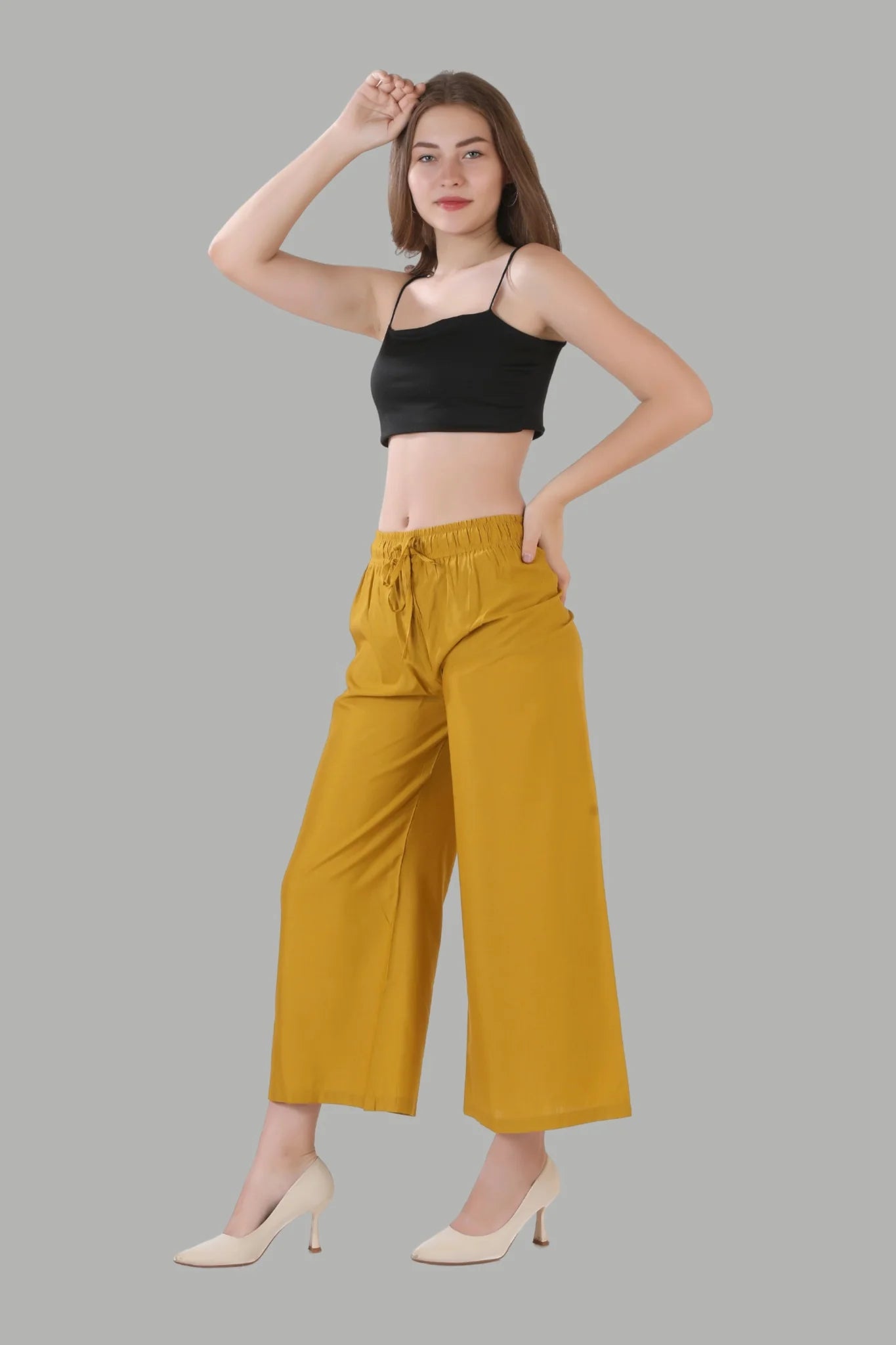 Comfortable women’s dark yellow palazzo by AIKAA