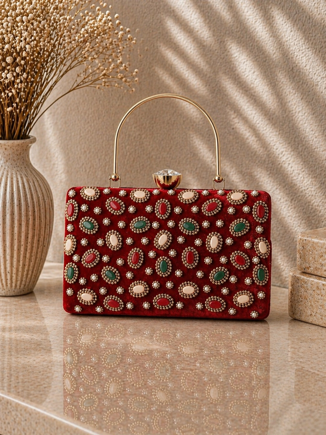 Elegant women’s designer clutch by AIKAA