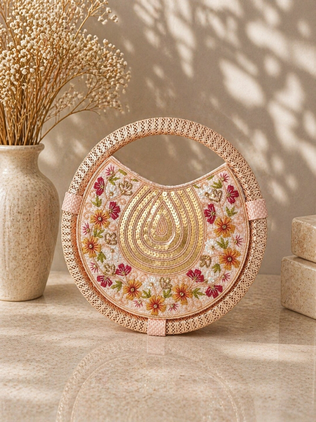 Elegant women’s luxury round clutch by AIKAA