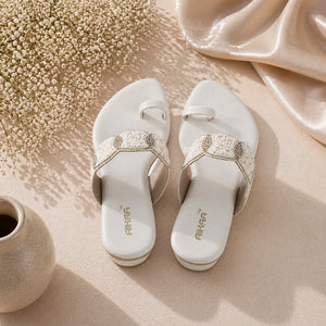 Comfortable women’s white flat sandals by AIKAA