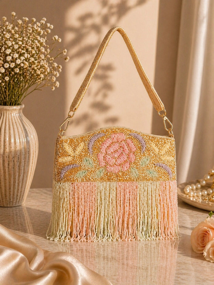 Embroidered sling clutch in gold for women