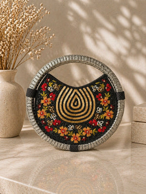 Luxe handcrafted round clutch for women