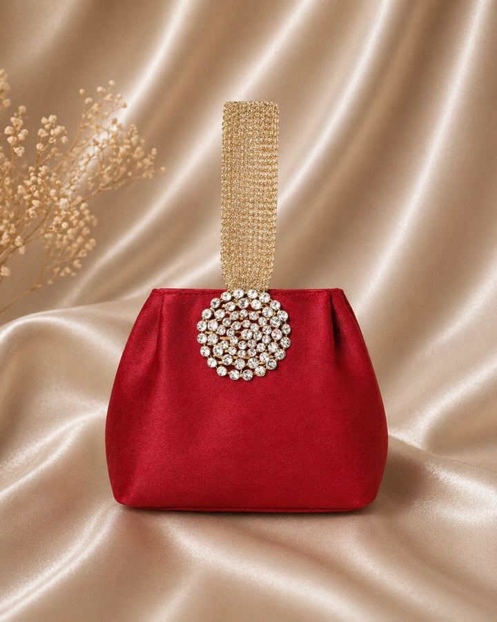 Stylish red embellished potli bag for festive wear