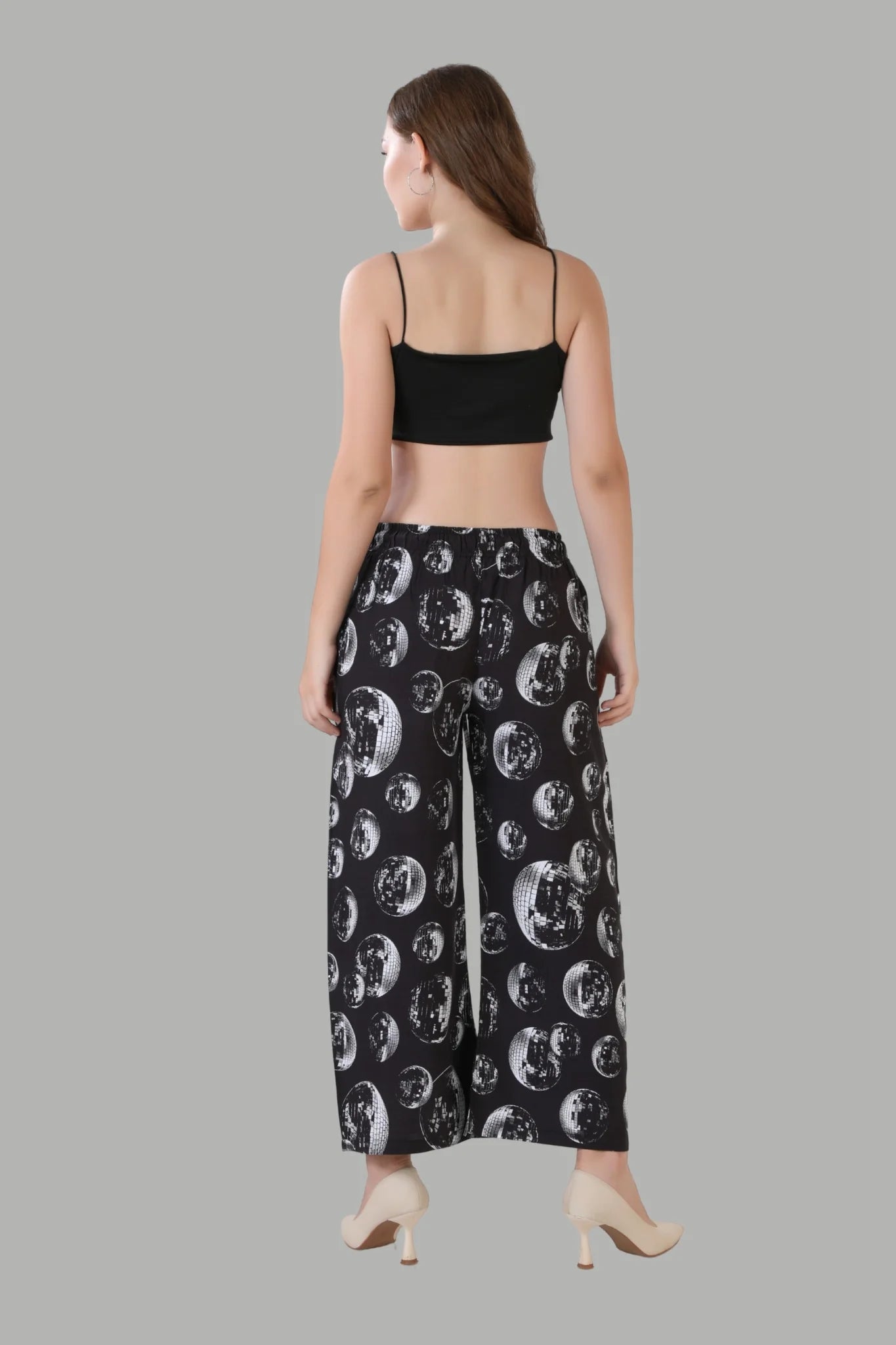 Elegant black wide leg palazzo pants with moon design