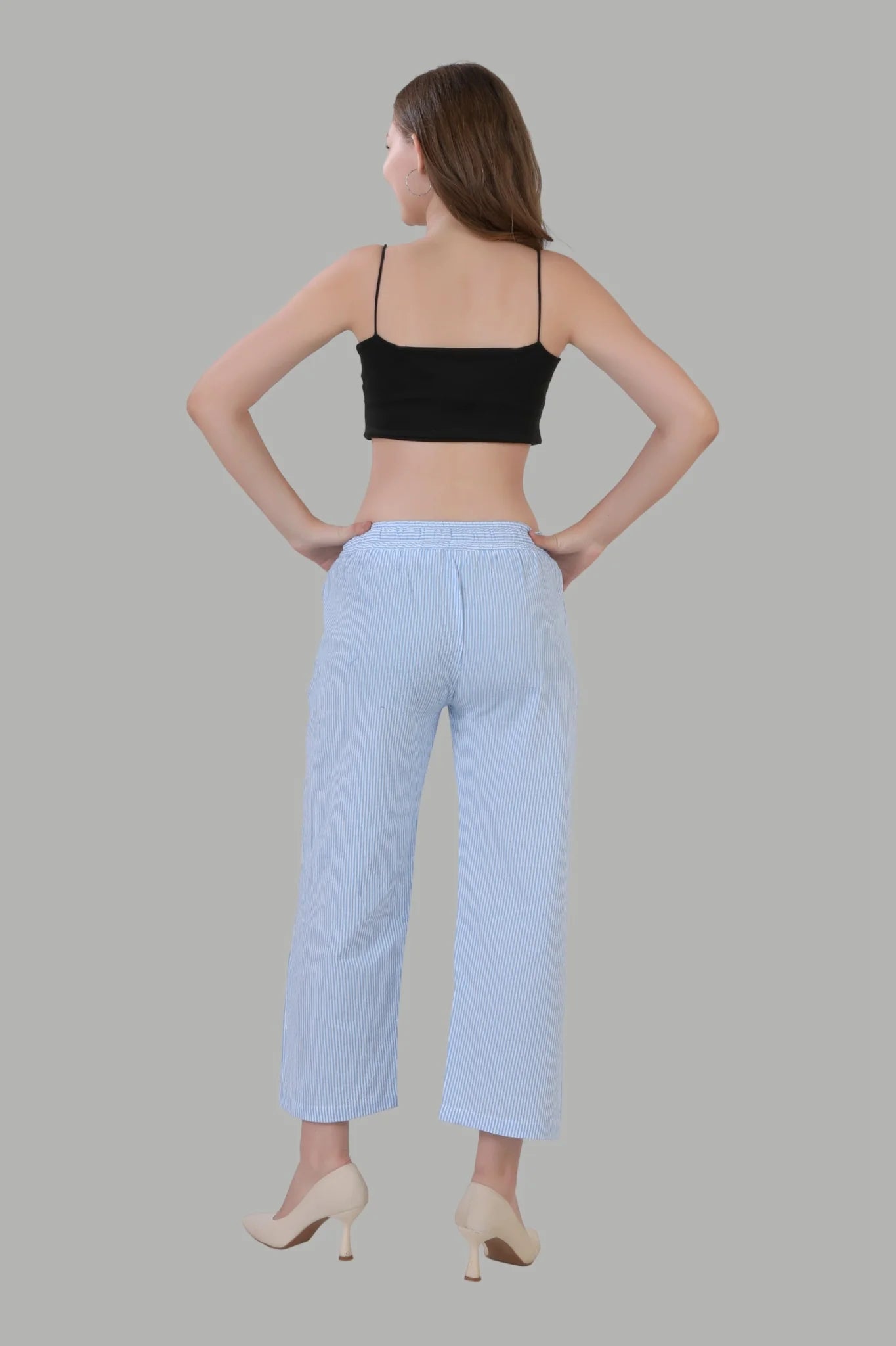 Elegant light blue linen trousers with white stripe pattern