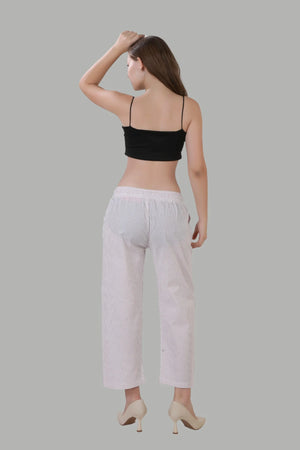Elegant light pink linen trousers with white stripe pattern