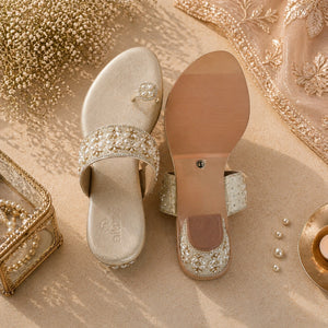 Elegant white ethnic footwear by AIKAA