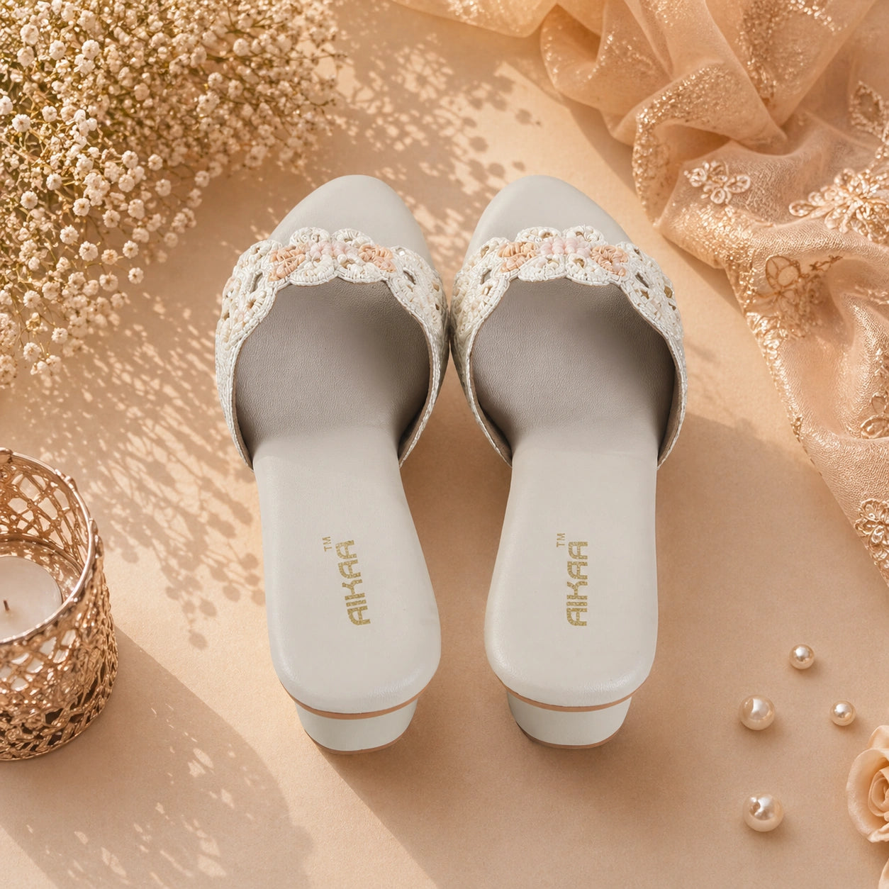 Elegant white traditional footwear by AIKAA