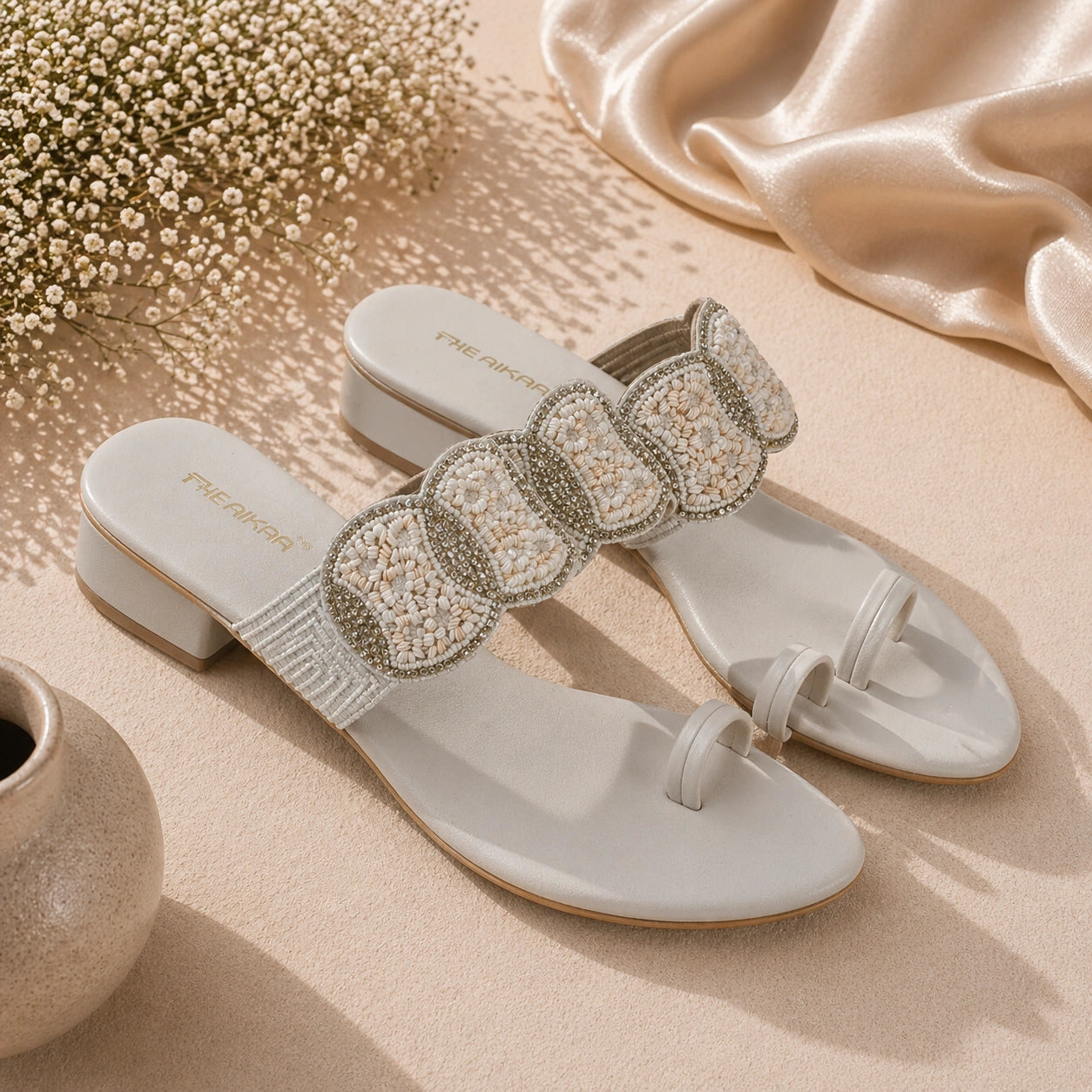 Elegant white ethnic slipon footwear for daily wear