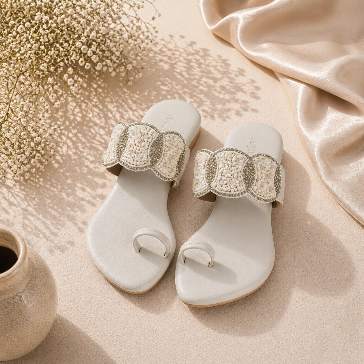 Stylish white ethnic toe-ring flats for women