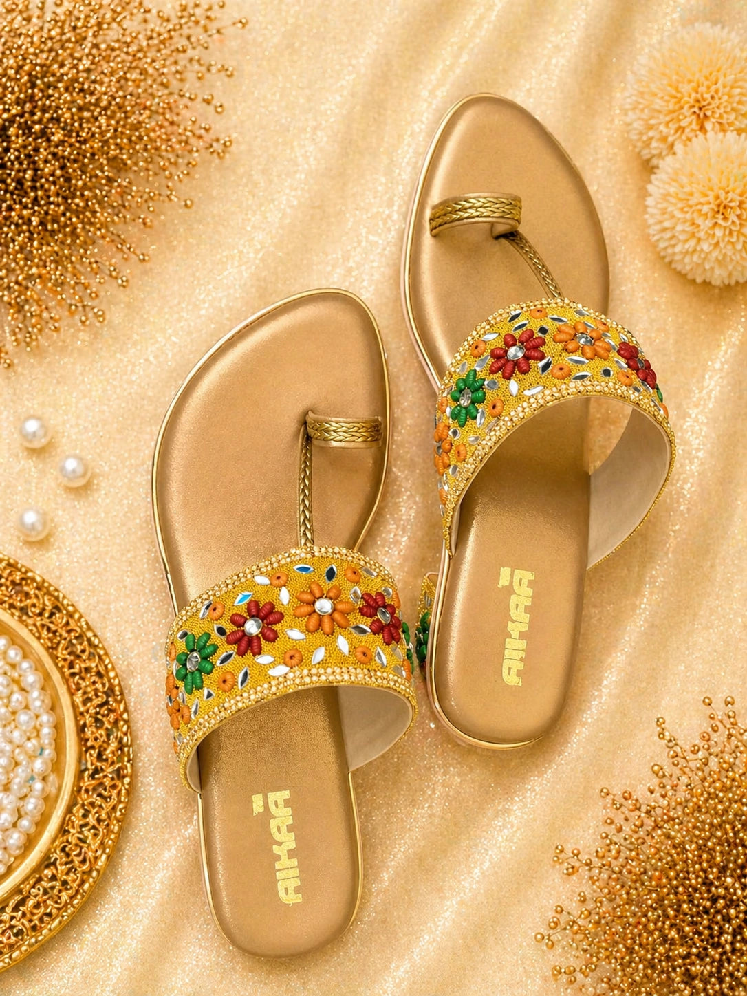 Fashionable AIKAA gold ethnic footwear