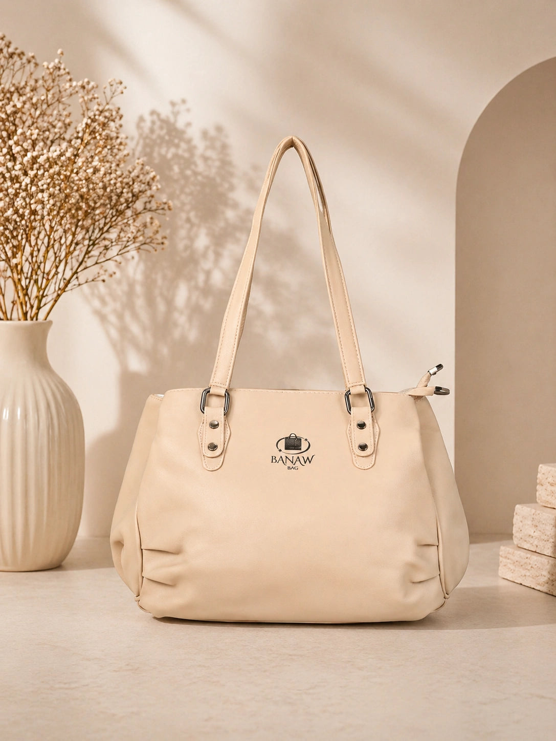 Women’s beige shoulder handbag